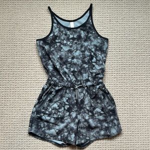 Athleta Girl romper. Size L/12. Black/gray tie die. Like new.